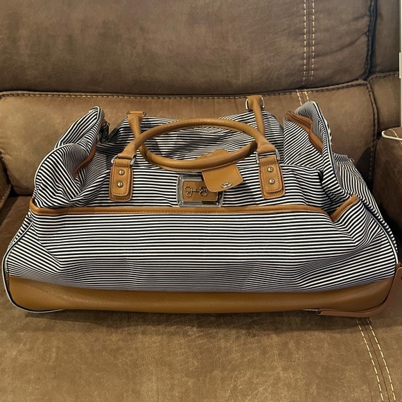 Jessica Simpson Handbags - Jessica Simpson Blue Striped Rolling Duffle Bag